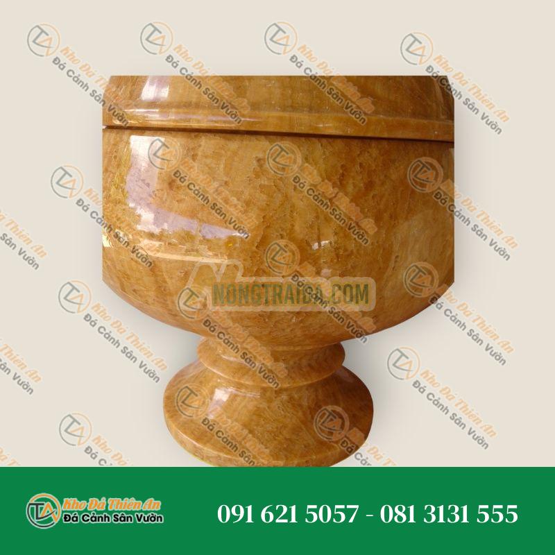 Bát trà phật, làm từ đá cẩm thạch, hình thù giống như hòn ngọc nước mật, kích thước cao 22cm, rộng 20cm