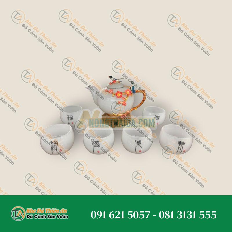 Bộ ấm trà chạm hoa mai và chim đá bạch ngọc
