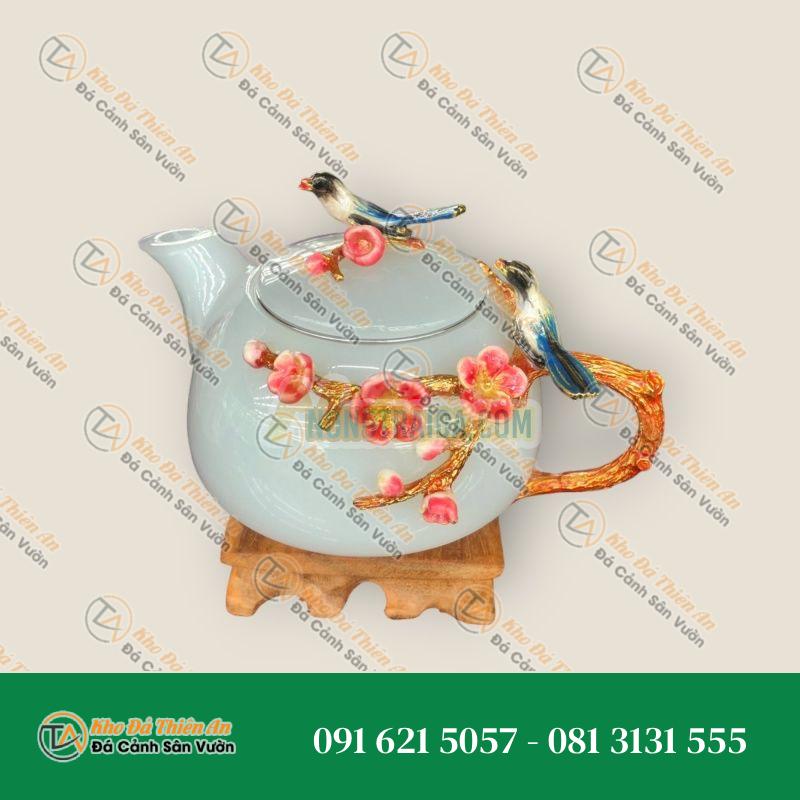Bộ ấm trà chạm hoa mai và chim với ly chạm chữ đá bạch ngọc