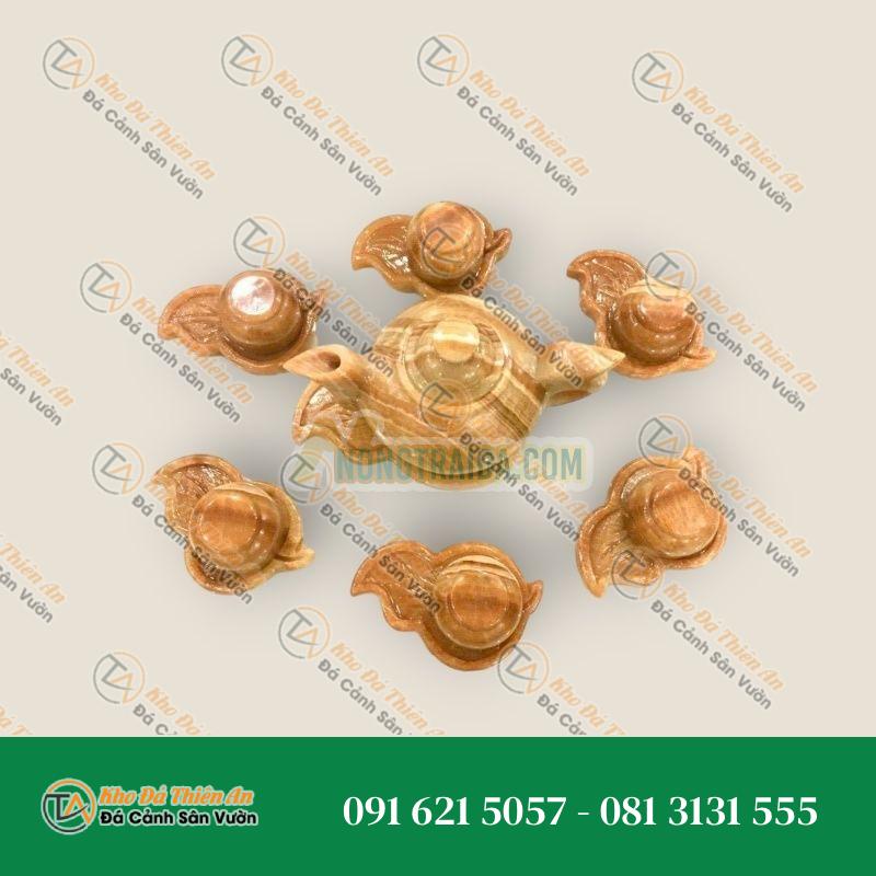 Bộ ấm trà với dĩa hình chiếc lá đá cẩm thạch vân gỗ