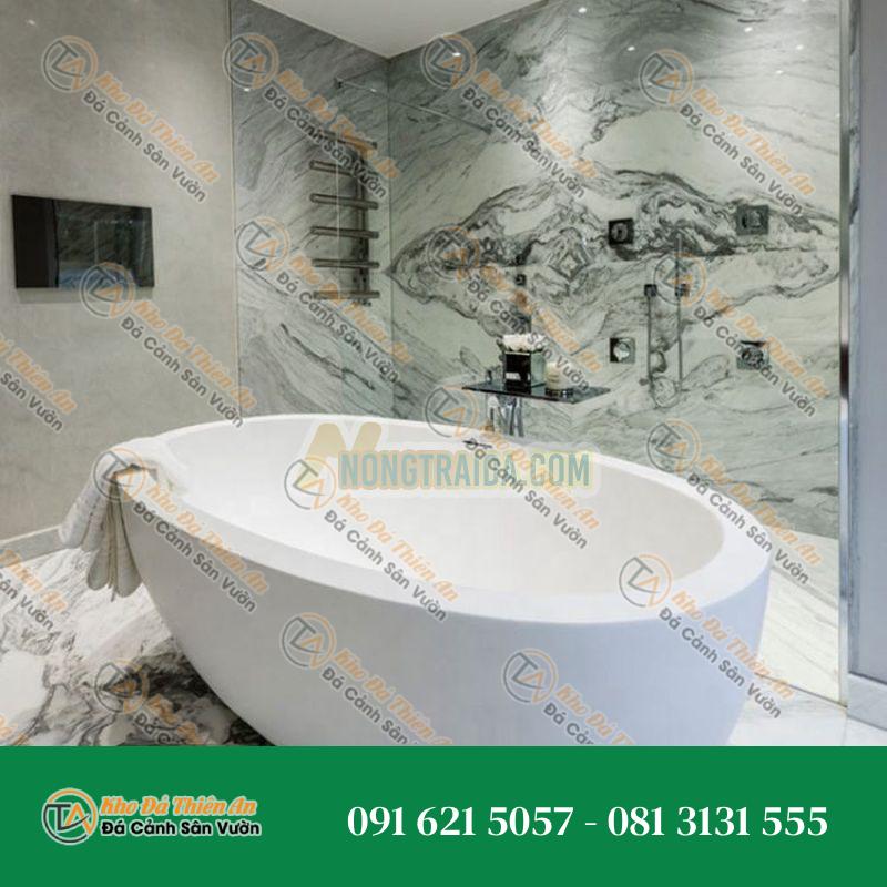 Bồn tắm đá hoa cương sỏi Hebei spa hình ovan, có bề mặt cổ điển và vị trí chống trượt màu ghi beige hiện đại với thảm đế