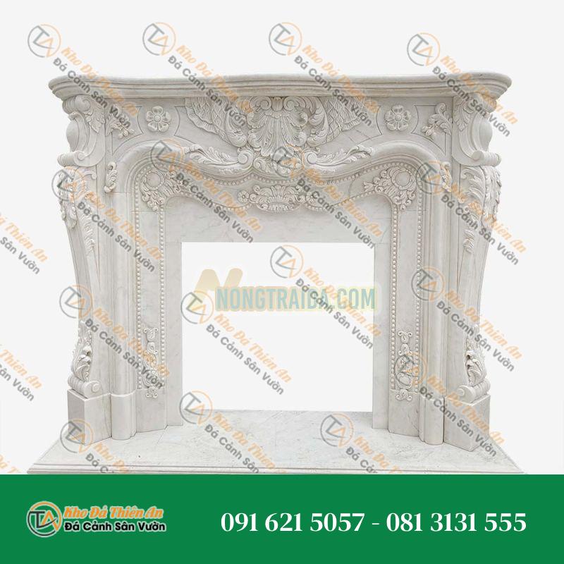 Lò sưởi bằng đá Marble với thiết kế khắc hoa văn hoa lá